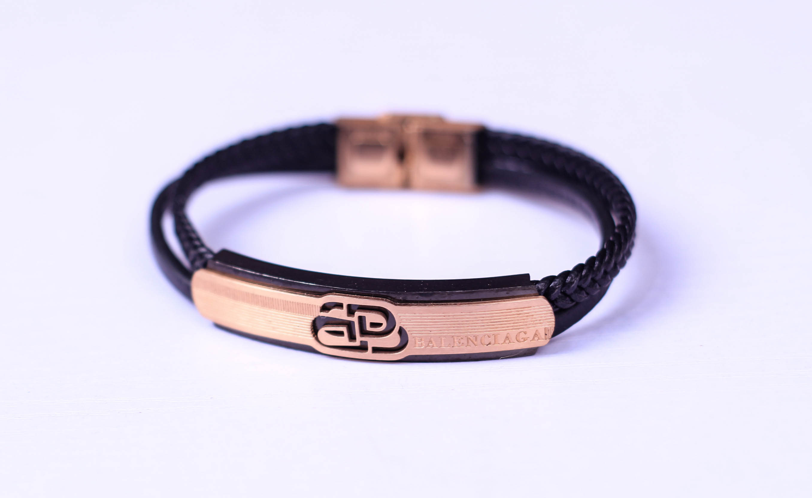 Black Plate logo-engraved corded bracelet | Balenciaga | MATCHES UK